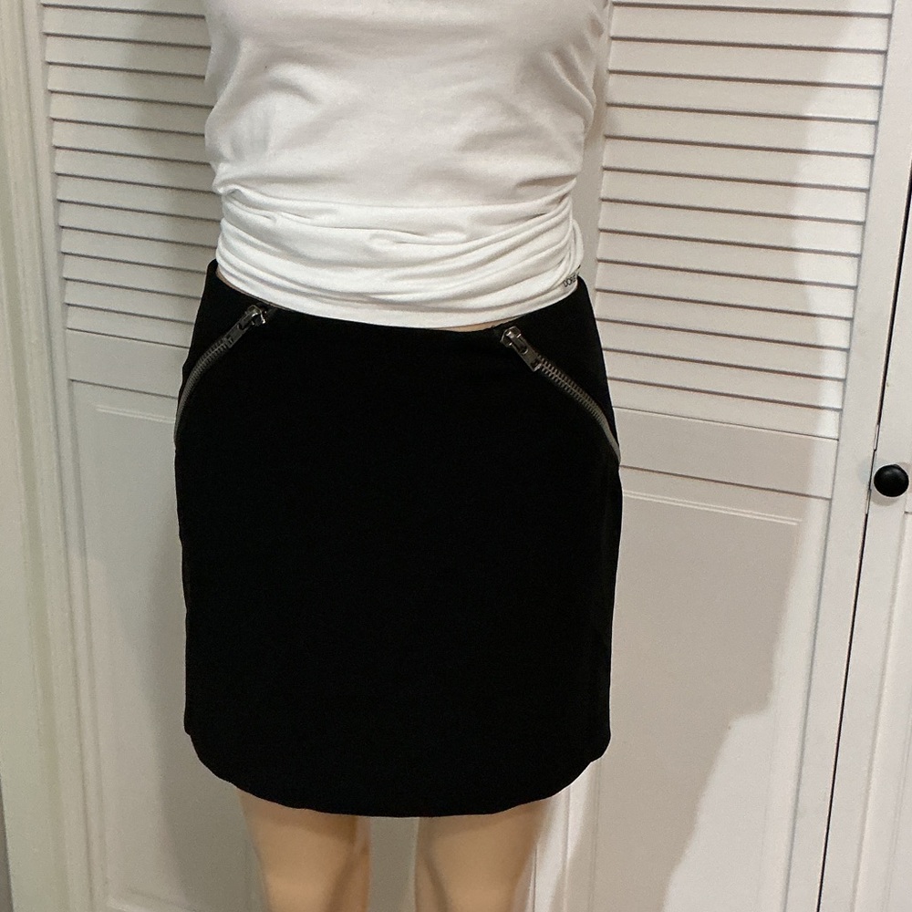 BCBGeneration Black Mini Skirt with Angled Zip Pockets